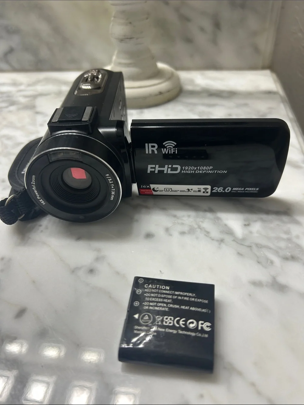 Compact Black Digital Camcorder with Flip LCD & Accessories. Charger port broken